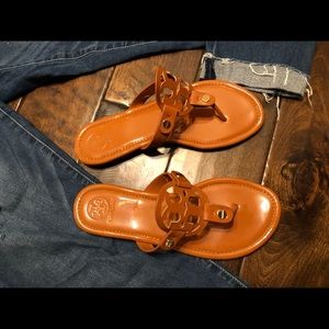 Camel brown flip flops